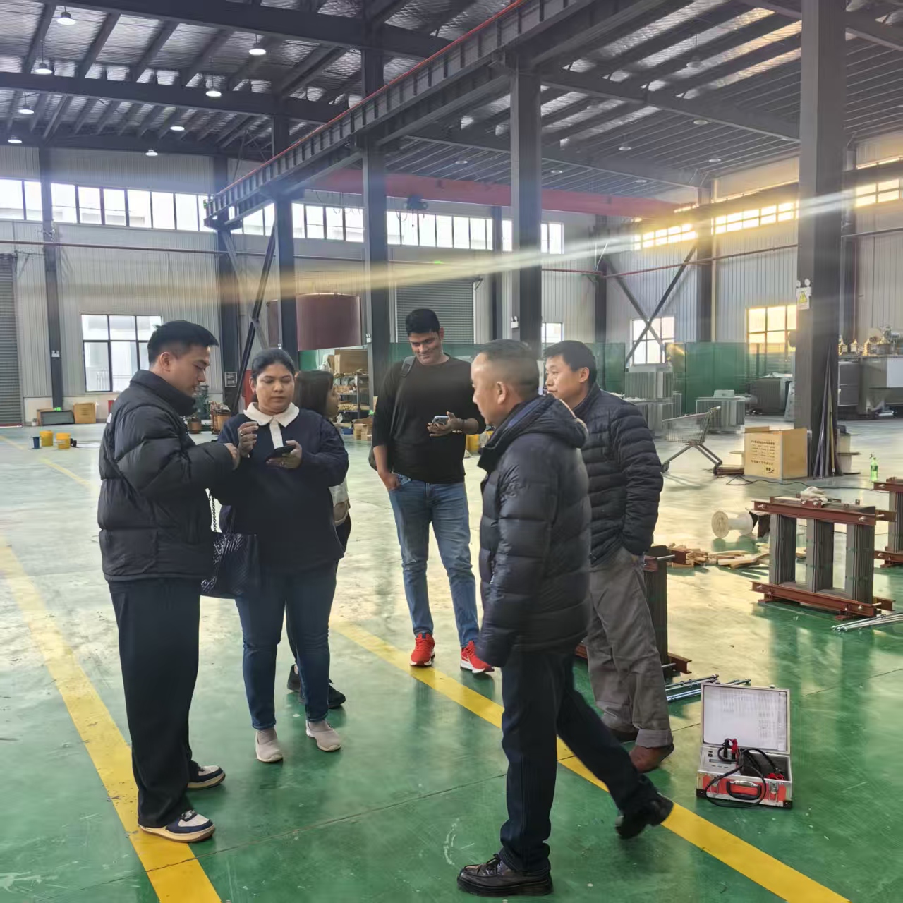 Client delegation at XinHuan manufacturing facility